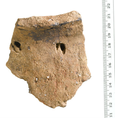 A sherd of pottery discovered by MOLA at a site in Shoreditch in 2020. It features an unusual decoration, and is part of the largest group of Early Neolithic pottery ever found in London © MOLA