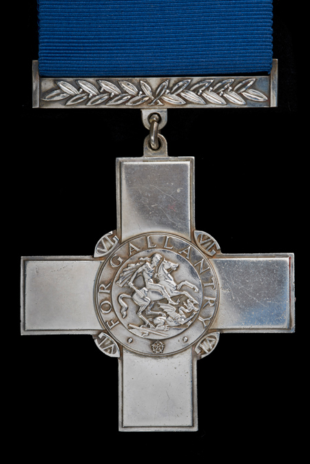 A George Cross awarded to Richard Moore during the Second World War on display at the Museum of London Docklands.