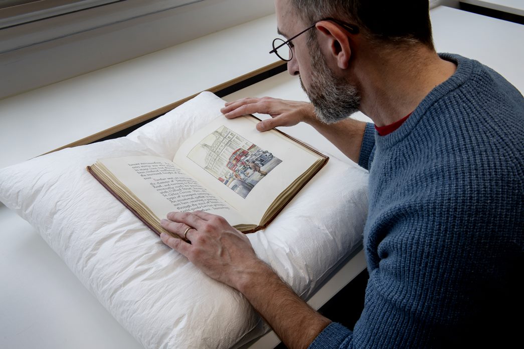 Placing special books on a cushion while leafing through them helps to keep them safe. Just like our Librarian has done with this unpublished artist's book by John Blundell from 1950. (ID no.: 2002.111)
