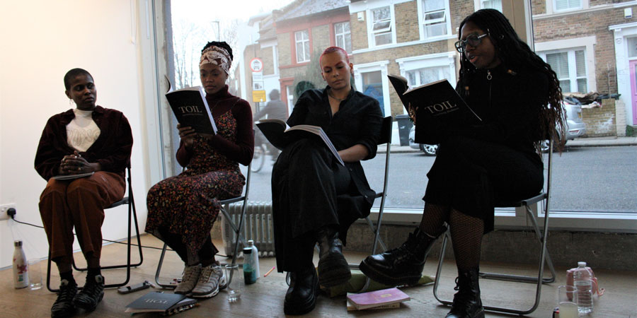 four participants of the Black Heritage London project presenting their publication