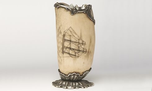 An engraved sperm whale tooth mounted on silver. Presented Alexander Munro to Sophia Knight, probably as a love token. (ID no.: 2018.25)