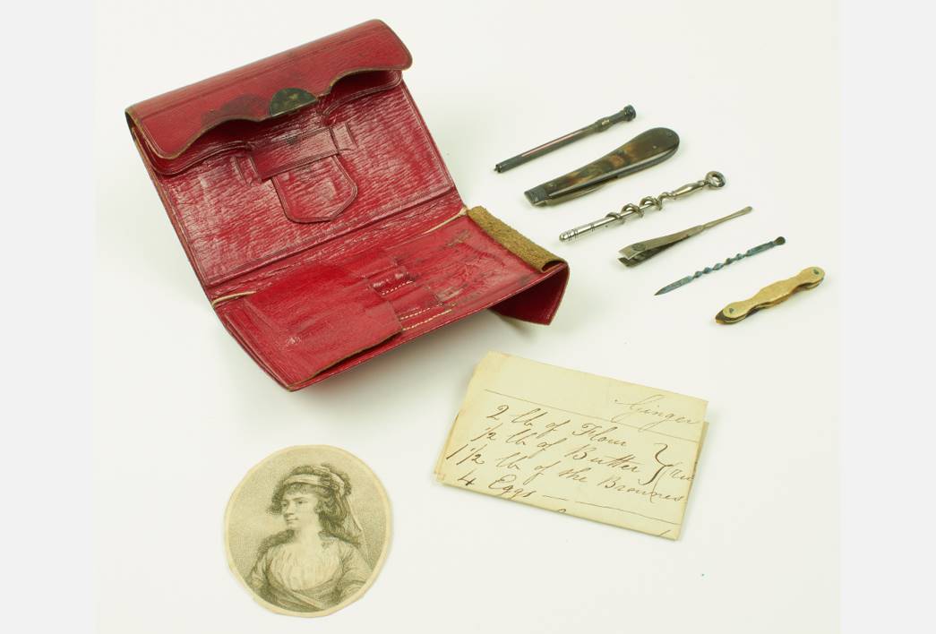 Red notebook with a gentleman’s toilet set, the engraving of an unknown woman and a ginger cake recipe, c.1850. (ID no.: 37.172/3)