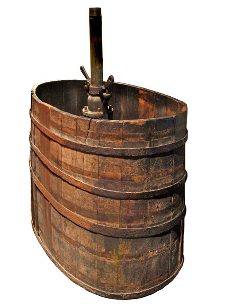 17th century fire engine barrel before restoration.