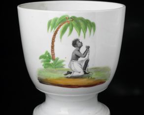 Sugar bowl with an abolitionist design depicting a pleading enslaved African.