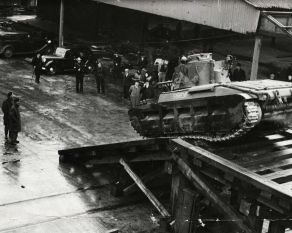 Tanks being embarked onboard ship at the Port of London, ready for the D-Day invasion. Copyright PLA Archive/Museum of London.