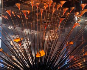 The London 2012 Olympic Cauldron on display with its petals open and splayed.